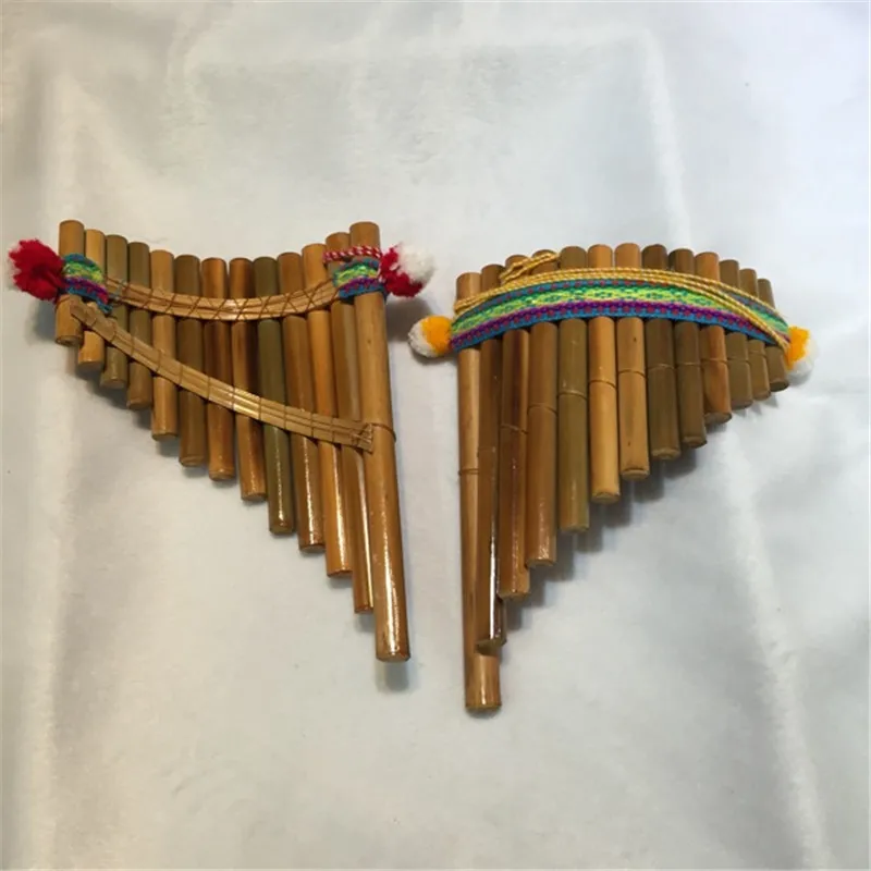 Южно-американский музыкальный инструмент Индиана флейта Пана Перу panflute яркий цвет