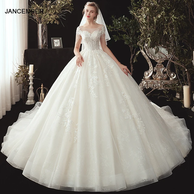 JKM023 White Wedding Dress 2021 New Temperament Bride Main Yarn Off-shoulder Trailing Luxury Dreamy French Light Gown 1