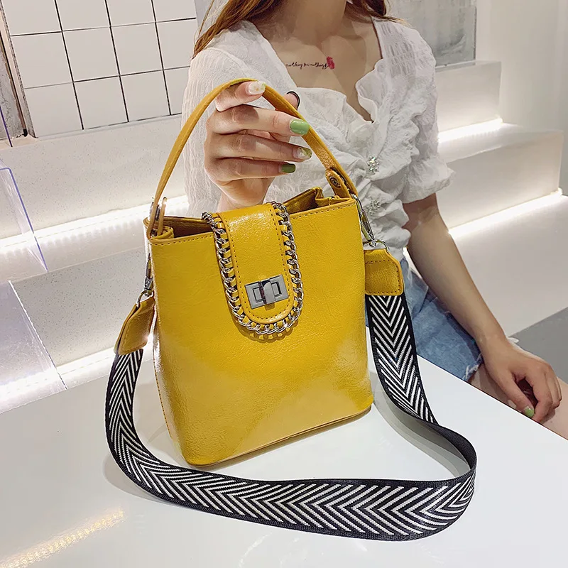 

2019 summer lovely women's bag spring and summer new handbag Korean version of broadband bag oblique bucket bag tide capacity