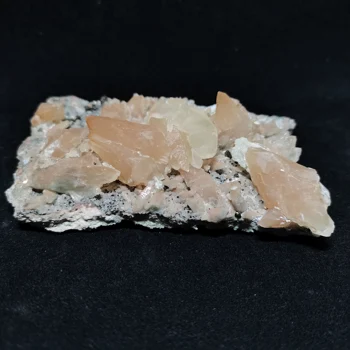 

155.0gMineral samples of natural pink calcite and pyrite Association