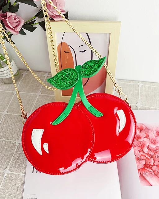 GERGIANA CLUTCH DAZ レッド タッセル付き GERGIANA CLUTCH DAZ レッド タッセル付き Shop Handbags