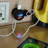 

Three In One Multi-function Car Voltmeter, On-board Thermometer,B Mobile Phone Charger