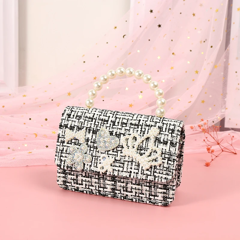 

Fashionable and elegant Mini Portable Pearl Accessories oblique across the chain Zero bag Little Princess cute bag
