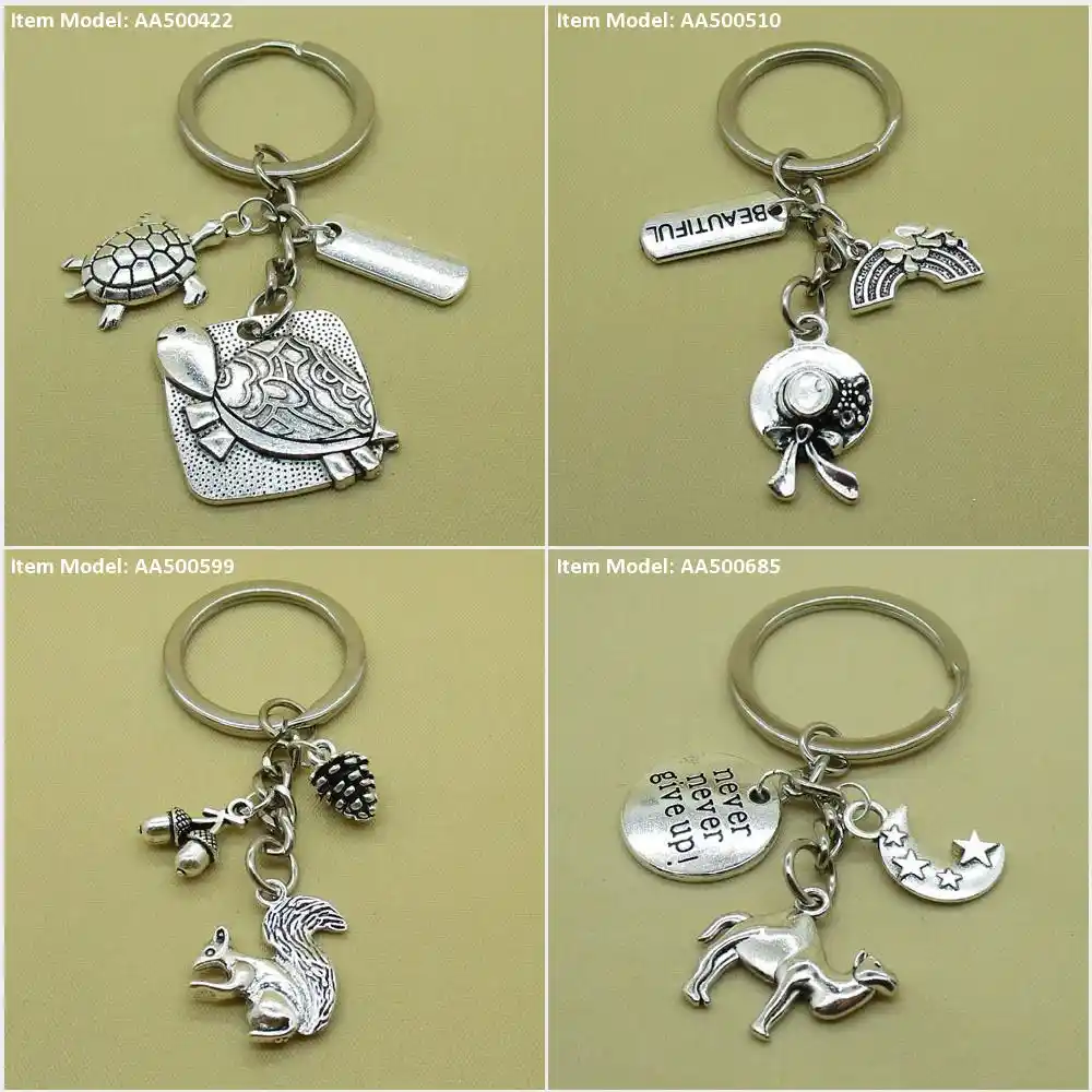 Chaveiro chaveiro sinal tag esperança tartaruga tartaruga chapéu palha senhora arco-íris bonito esquilo nozes bolotas cone pinho pinecone camelo