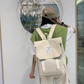 

2020 new canvas backpack ladies simple Korean version of the campus solid color flip large capacity student backpack women