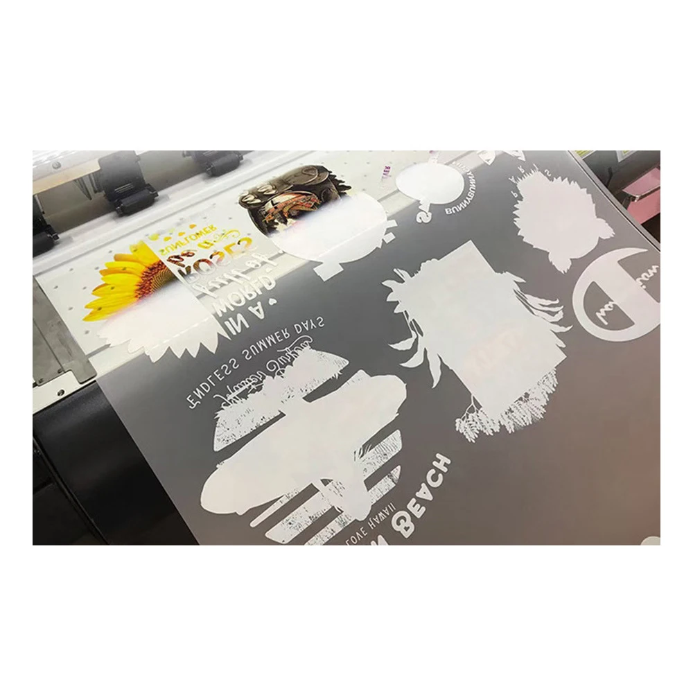 30*100m DTF PET 무광택 롤 필름은 Epson L1800 용 티셔츠 의류 면화 린넨 폴리 에스터 섬유 전사 인쇄에 직접 사용됩니다.