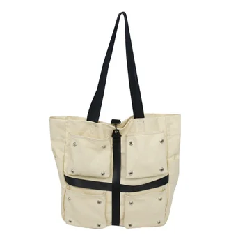 

Fashion canvas bag summer new bag large capacity lightweight breathable men and women shoulder bag tide rivet portable big bag