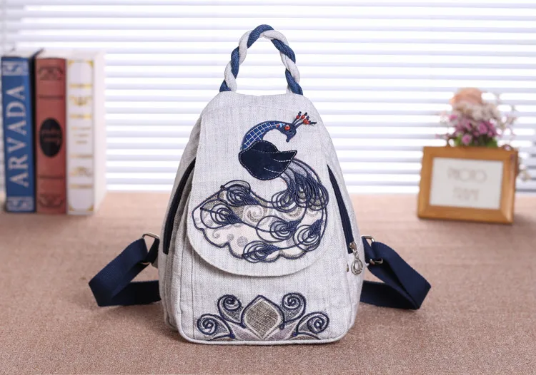Fashion national animal string appliques women shopping backpacks!Nice embossing lady double-layer backrack Hot canvas backruck
