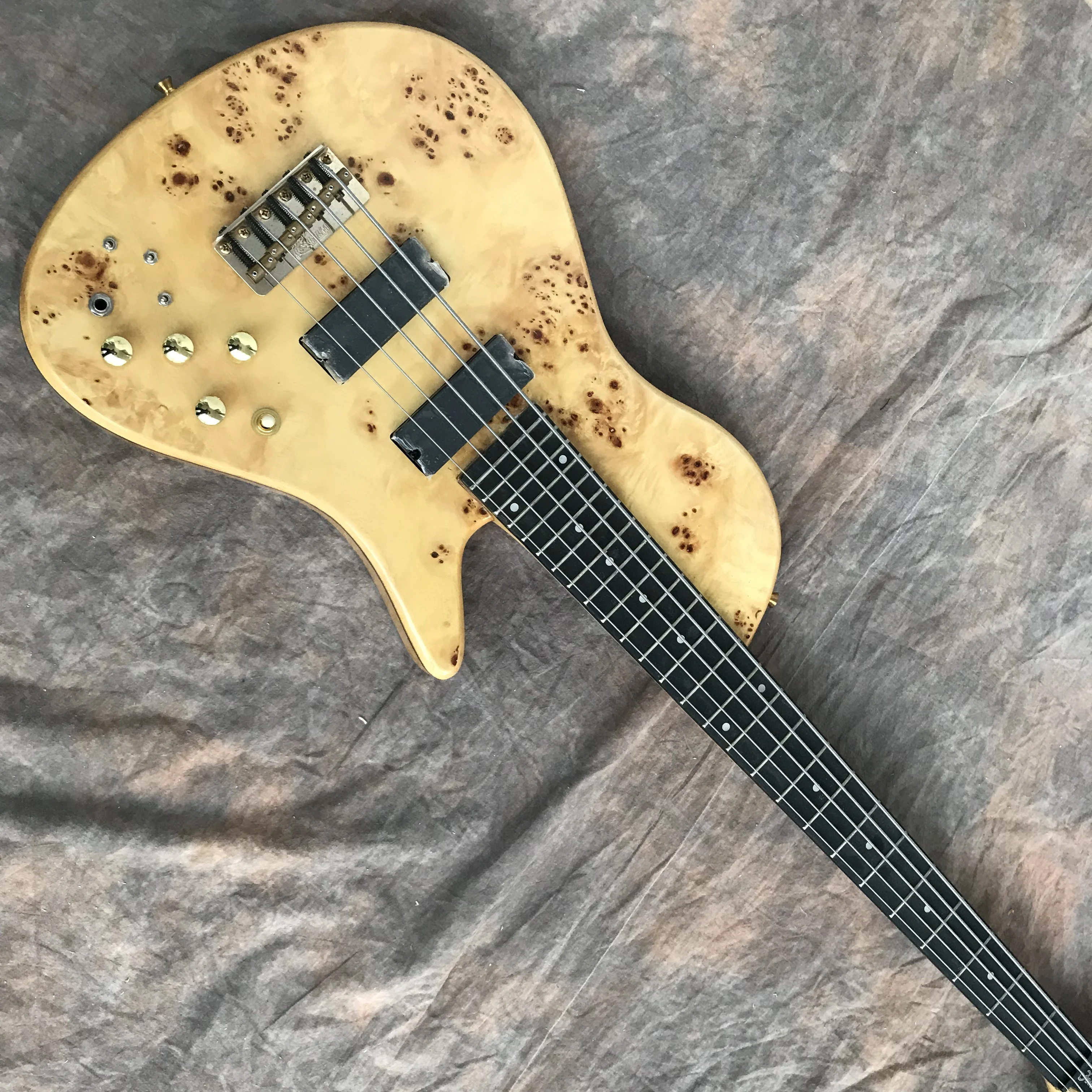 

Bespoke shop custom bass, 5-string bass, new hot sale,Natural burr scar blouse,elm body, custom fingerboard inlaid and color.