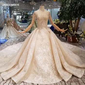 شراءHTL106 2020 مواد جديدة فساتين الزفاف مع الملكي قطار طويل س الرقبة طويلة الأكمام الفاخرة اليدوية العروس ثوب زفاف الموضة