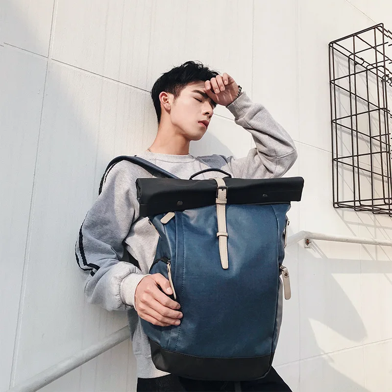 

The new men's Korean version of backpack multifunctional computer bag university student bag personality backpack
