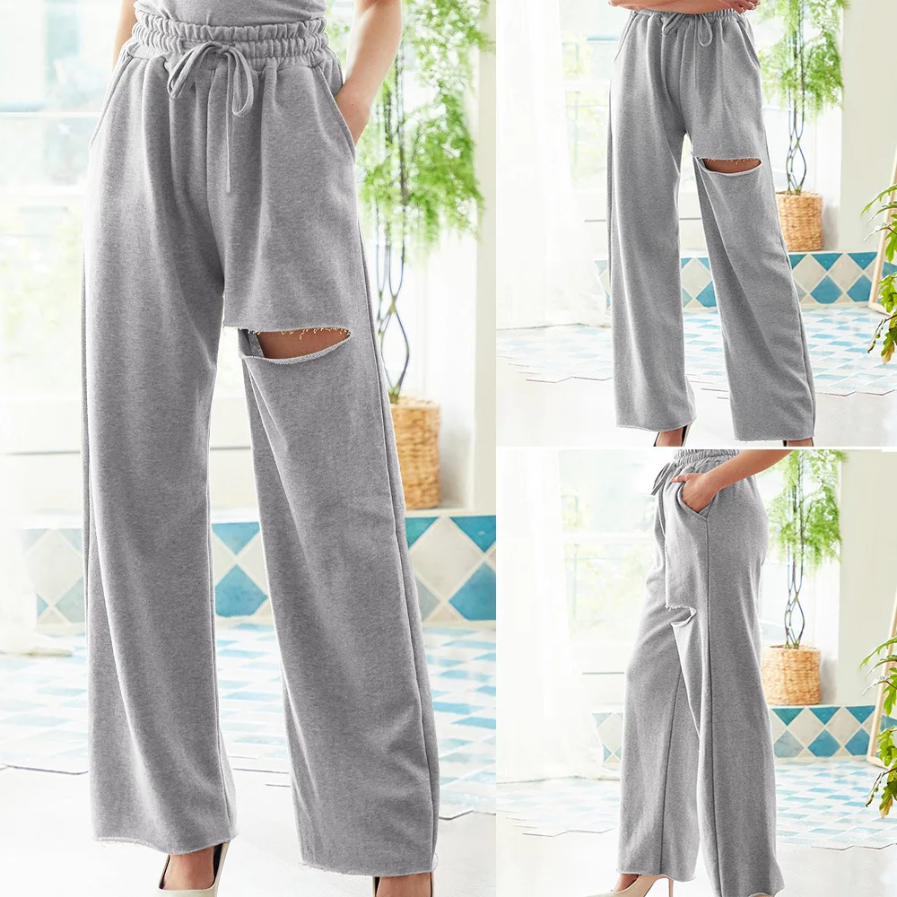 

Women Ripped Trousers, Solid Color Side Pockets Drawstring Pants Loose Leisure Wear