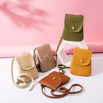 

2020 new summer simple solid color retro small round bag single shoulder messenger saddle bag round two-layer leather small bag