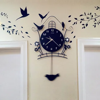 

household Wrought iron wall clock modern design ou The sitting room The bedroom mute swing Clocks and watches best selling 2018