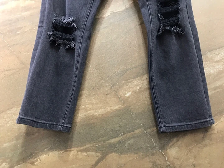 The new autumn and winter women's street personality hole jeans 1207