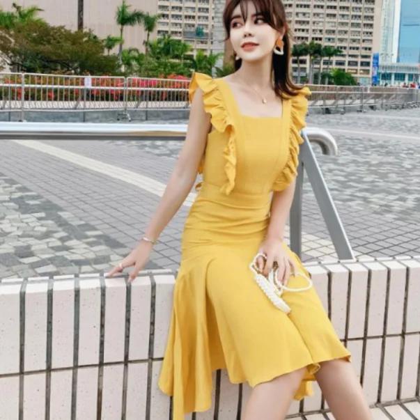 Элегантное женское платье Trumpt летнее желтое длинное без рукавов на шнуровке 2020