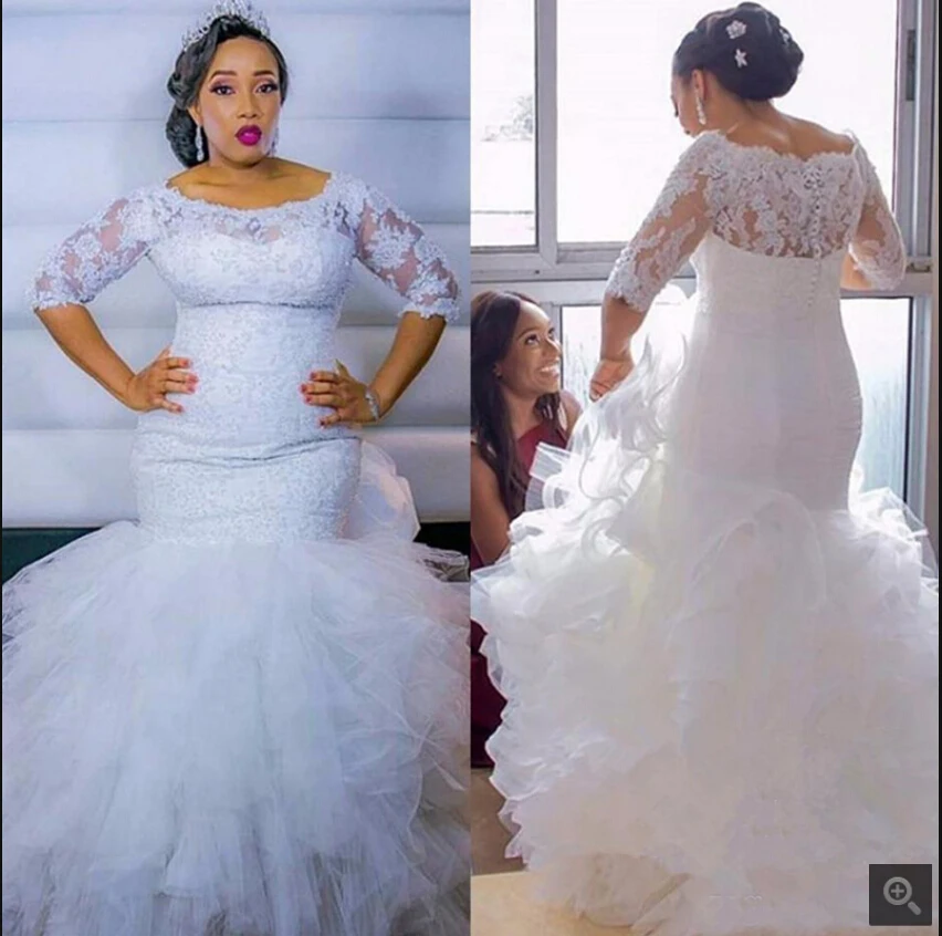 Robe De Mariage Afrikaanse Zeemeermin Plus Size Trouwjurken 2020 Half Sleeve Lace Tiered Cascading Ruches Kralen Bruidsjurken Robe De Mariage Afrikaanse Zeemeermin Plus Size Trouwjurken 2020 Half Sleeve Lace Tiered Cascading Ruches Kralen Bruidsjurken