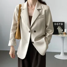 Blazer Beige con abertura en la espalda y botones para mujer, Top acolchado holgado con hombros descubiertos, abrigo de traje elegante de estilo de diseño