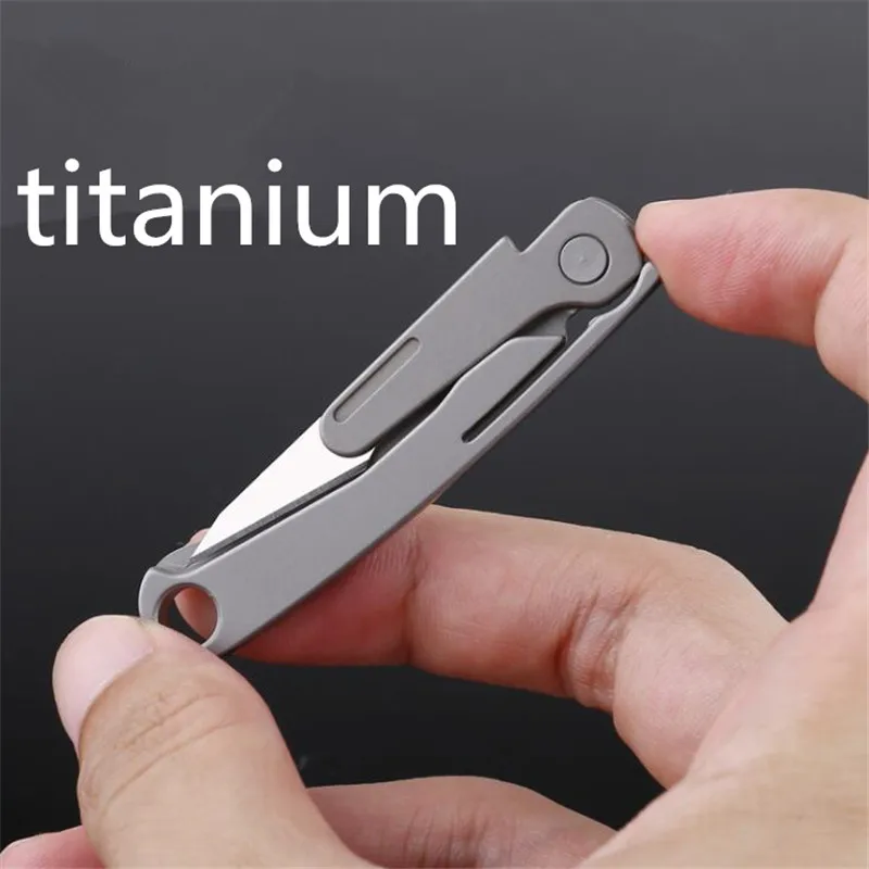 

Outdoor titanium EDC tools. Mini titanium alloy art knife, folding and carrying EDC emergency key chain pendant.