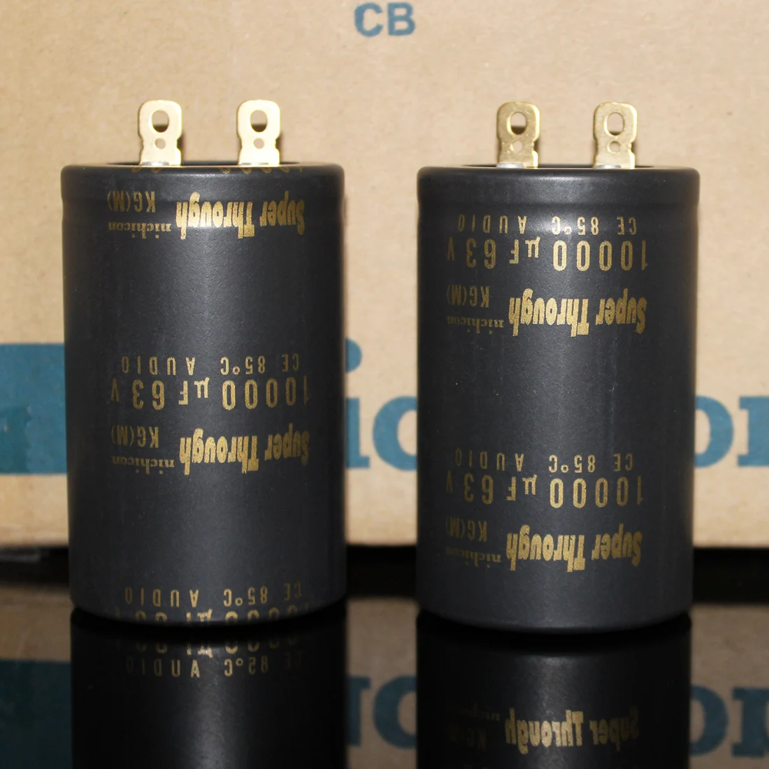 Усилитель NICHICON KG Super Through 63V10000UF 50x80 мм аудио 10000 мкФ 63V фильтрация мкФ/63V Golden feet 10000U 2