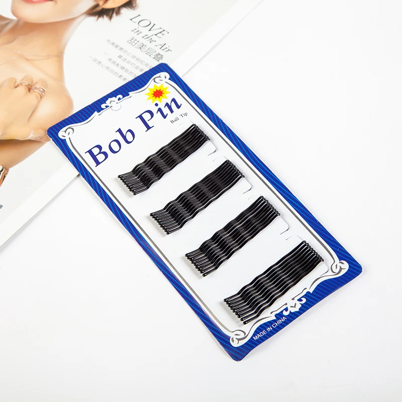 Рисунок 5 - Черная плоская заколка для волос