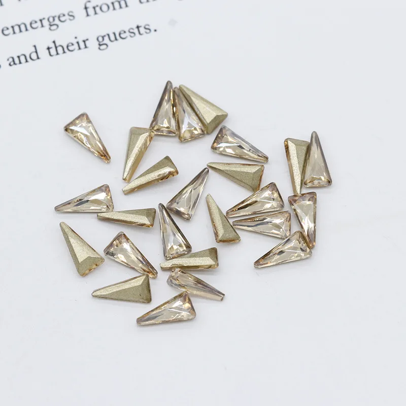 Lamemoria 10pcs Triangle Rhinestones 3D Nail Art Charms AB Color Flame Rhinestone Gold Bottom Gems Holo Nail Decoration Manicure - Цвет: Champagne 10pcs