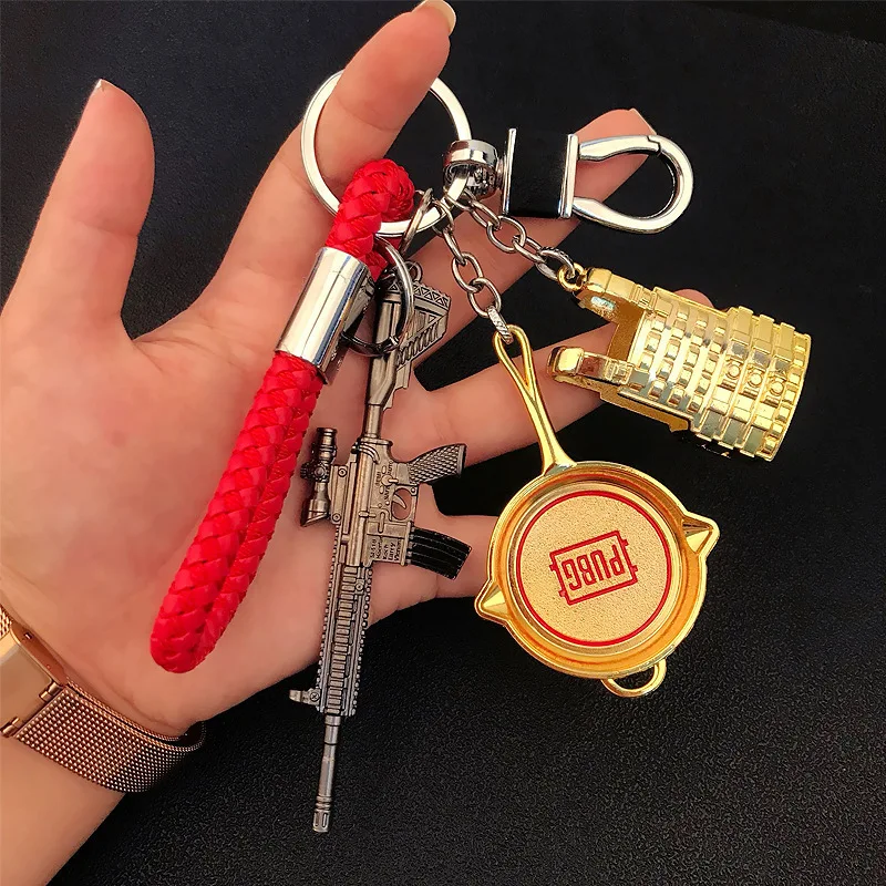 

PUBG Key Chains Shooting game Accessories Weapon model key chain three-stage helmet 98K car key ring pendant Mini AWM key pendan