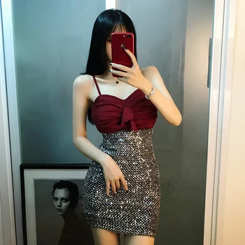 

New sexy ruffled camisole + high waist heavy industry sequins slim package hip skirt suit