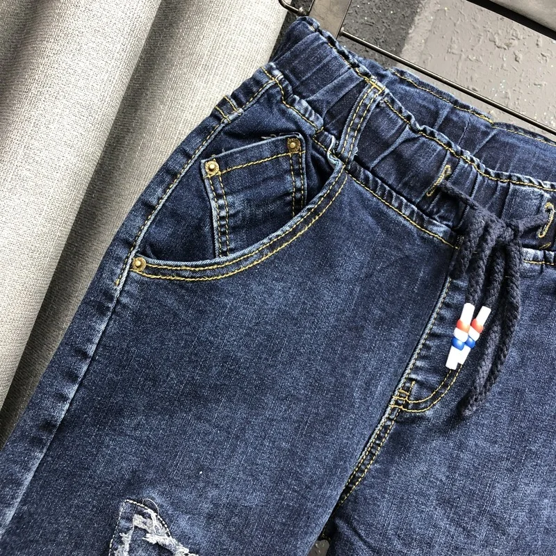 hole Personality patch patch pants women spring and autumn new Korean version of the slim loose harem pants