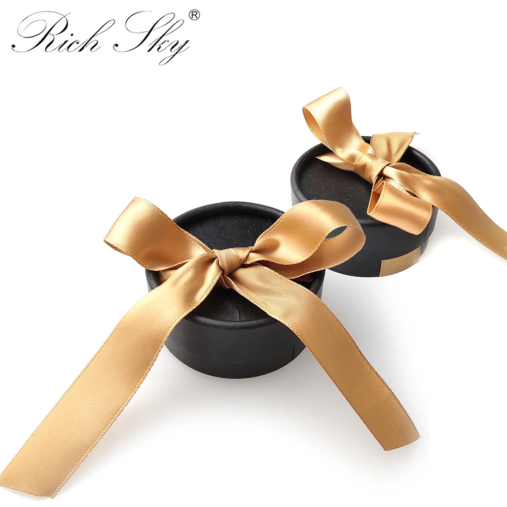 

Rich sky luxury black round box with bow ribbon