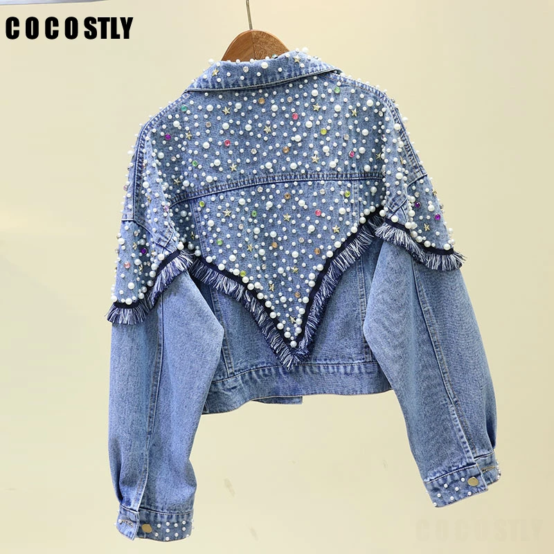 black denim jacket with tassels