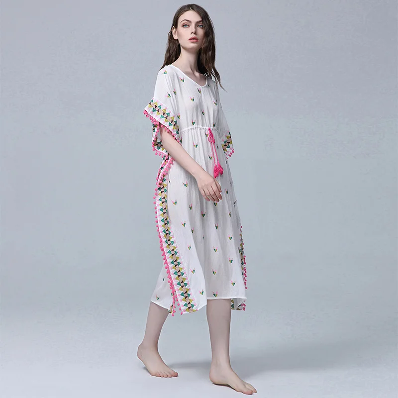 

The new Bohemian dress is a long dress for women holidaying in sexy beach embroidered bobo balls
