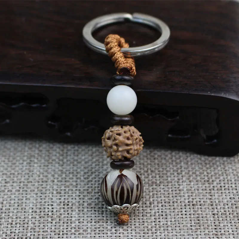 

Wholesale Cool Exquisite White Lotus Bodhi Root Keychain Jingang Pipal Tree Seed Key Chain Pendants Origional
