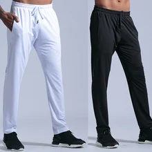 Новые белые/черные мужские тренировочные штаны для бега, спортивные бег трусцой баскетбольный спортзал, штаны для занятий фитнесом, Длинные свободные брюки