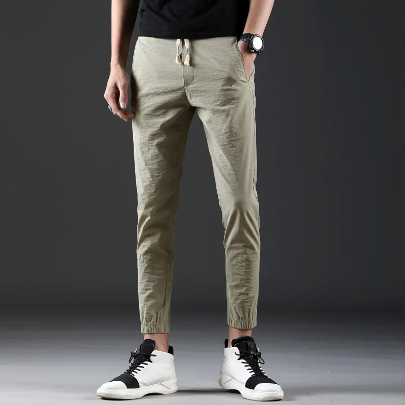 

Spring Men Lace-up Elasticity Casual Skinny Capri Quick Drying Pants Men's Fashion Casual Beam Leg 9 Pants 8626