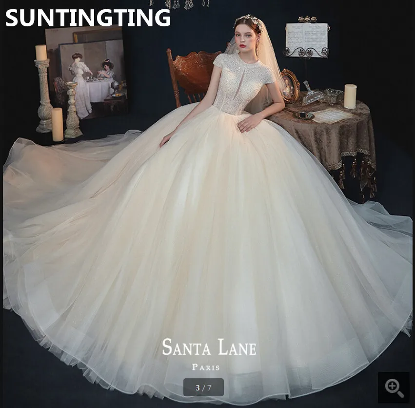 

2020 attractive champagne tulle ball gown wedding dress heavily beading sequins cap sleeve bridal gowns hollow back sexy bridal