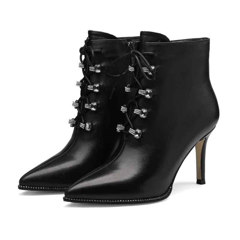 

In autumn and winter , leather women's boots pointed thin high heel women's shoes metal rhinestone zipper fashion short boots