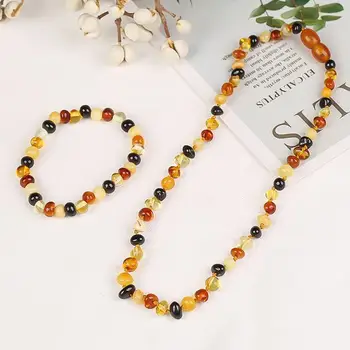 

Natural amber beeswax baby necklace children baby teething European imports Banby degree with the same paragraph fidelity specia