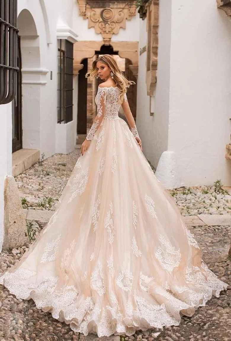 2021 Gowns Champagne Mermaid Wedding Dresses Lace Appliques Sheer Long Sleeves Tulle Bridal