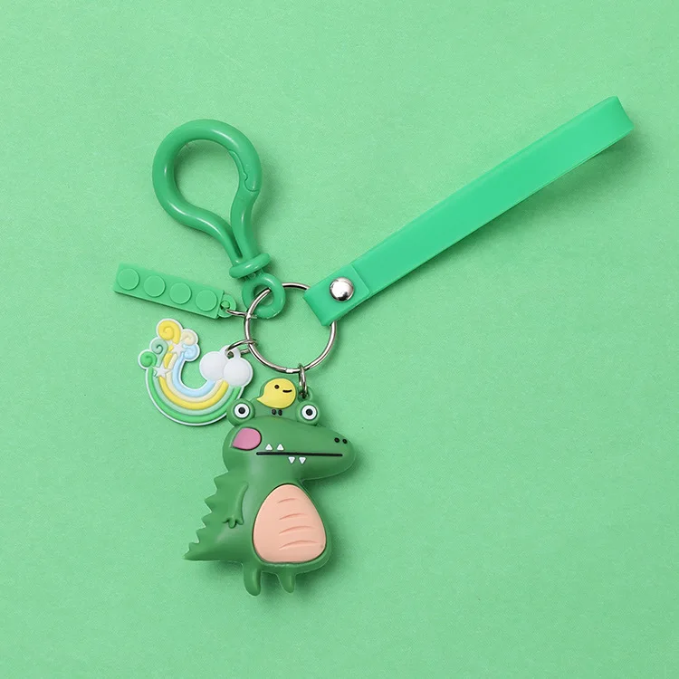 2020 New cute dinosaur keychain new drop glue PVC soft plastic pendant couple key chain claw machine doll small gift |