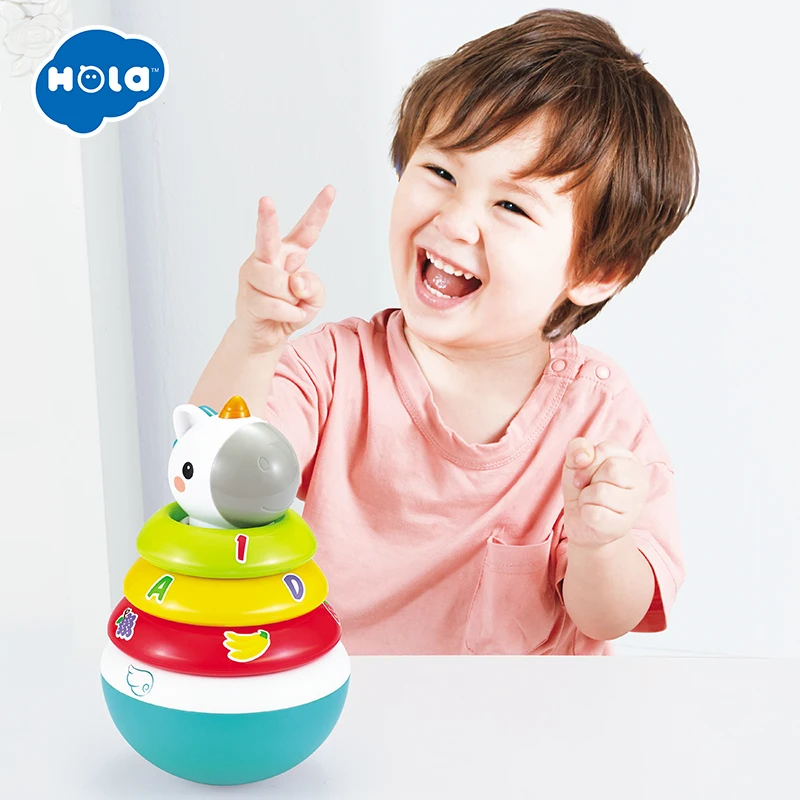 

HOLA TOYS Baby Rattles Mobile Doll Bell Blink Eyes Tumbler Roly-poly Silicon Teether Toy Fun For Newborns Gift