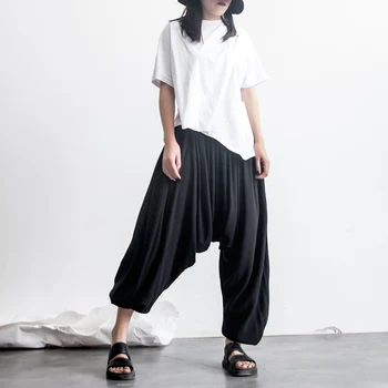 

Korea 2020 New Spring Fashion Black Elastic Waist Loose Pleated Pockets Solid Color Woman Ankle-length Cross-pants SA085