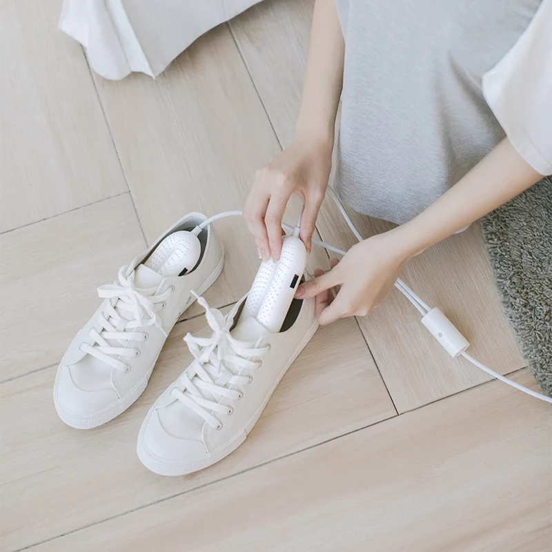 Koop Nieuwste Draagbare Huishoudelijke Elektrische Desinfectie Schoenen Droger Uv Constante Temperatuur Drogen Ontgeuringseffect