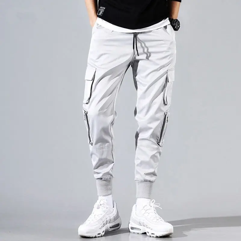 Брюки-шаровары с карманами для мужчин; сезон осень-зима; повседневные спортивные брюки в стиле хип-хоп; новые дизайнерские узкие брюки-карандаш