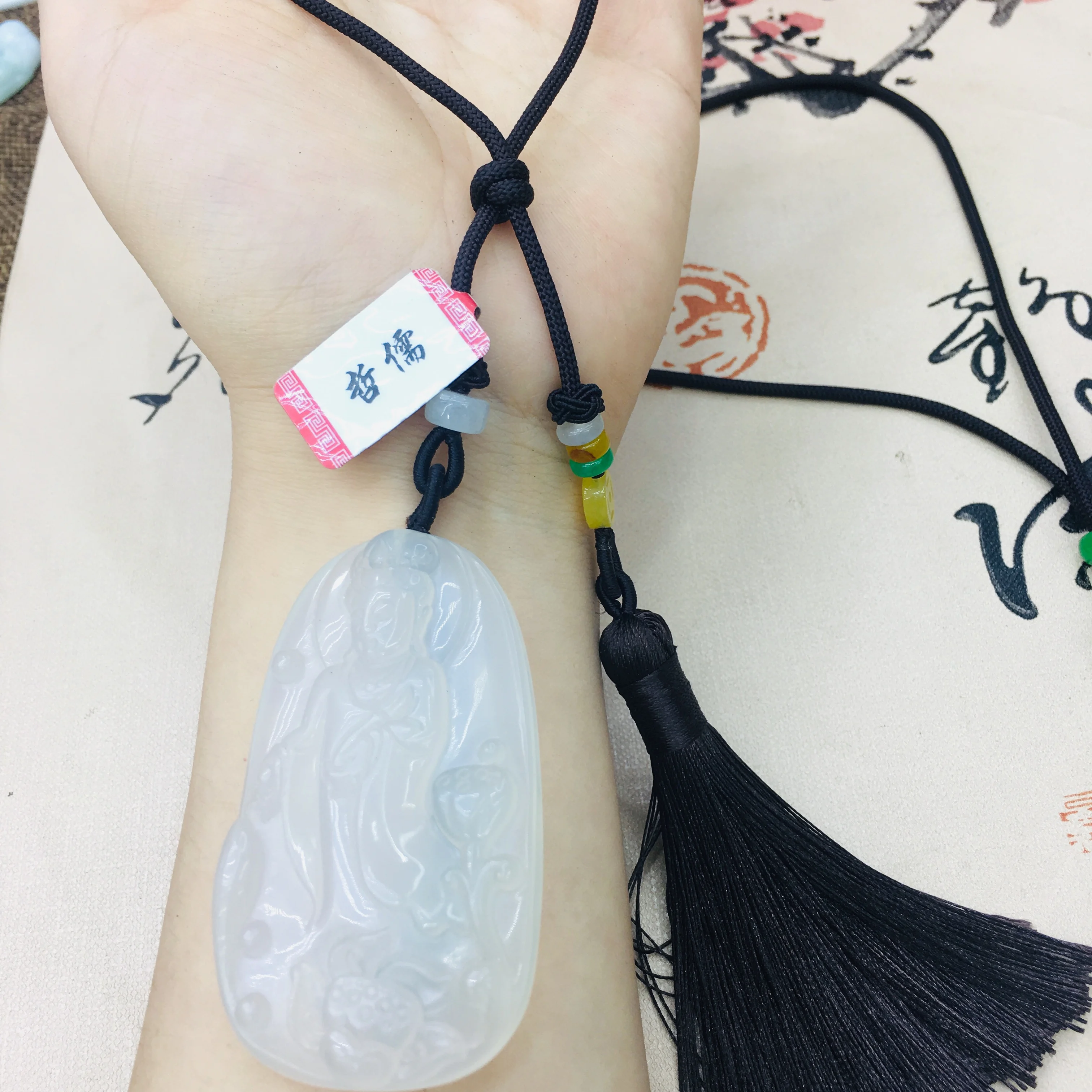 

Natural high ice white chalcedony jade carved stereo Guanyin pendant with hand-woven tassel necklace Men's women's sweater chain
