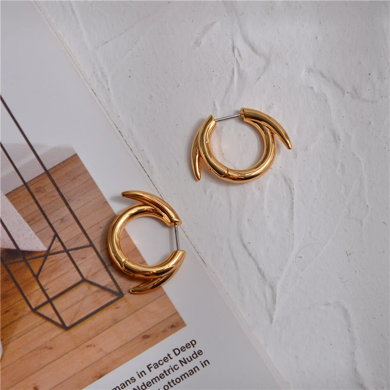 Golden spike circle earrings female European and American minority design personality punk style cool handsome cool earrings