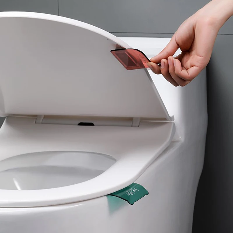 Toilet seat cover handle