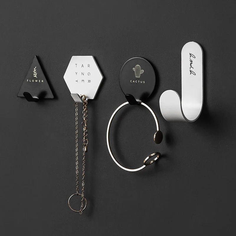 

4pcs/set Simple Geometric Elements Key Hook Holder Nordic Self-adhesive Wall Coat Hanger Rack Storage Organizer Home Decoration