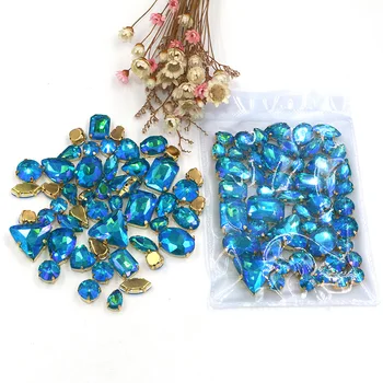 

Sell at a loss!mixed shape Crystal Lake Blue AB sew on glass claw rhinestones with gold base diy clothing accessories
