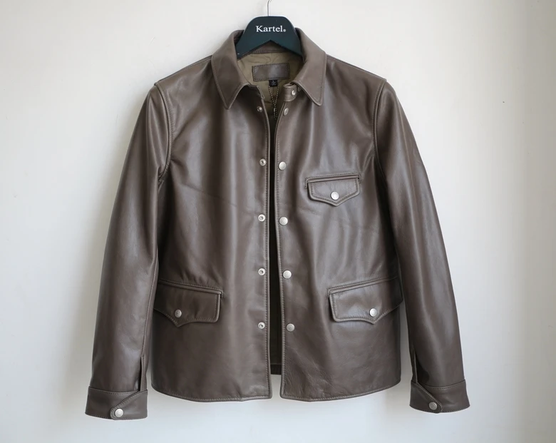 

Free shipping.Super driving leather jacket.US style.men genuine leather coat.classic style Engraved jackets.Limited clothing
